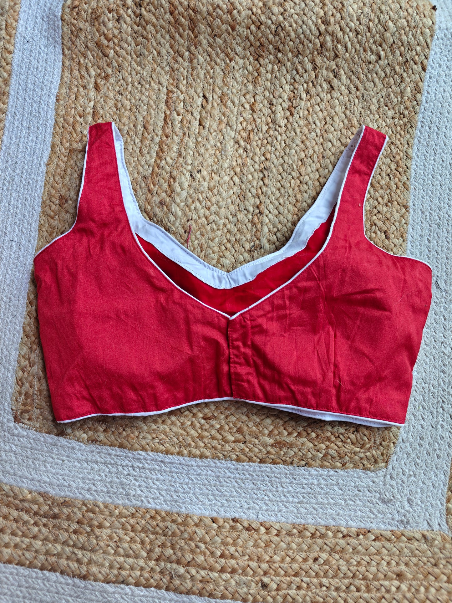 Red Sleeveless Blouse