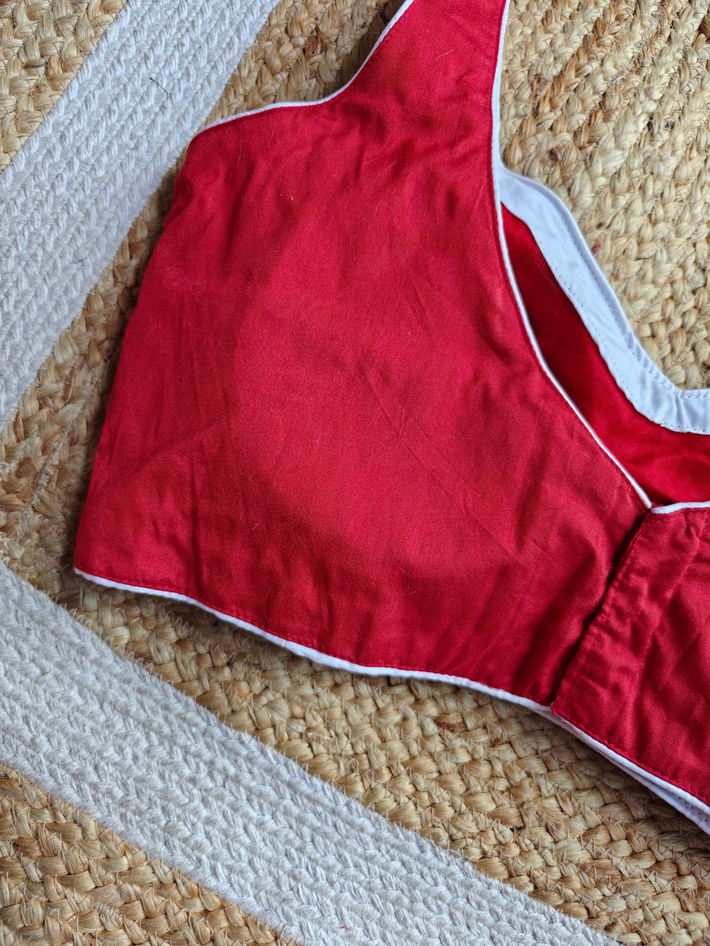 Red Sleeveless Blouse