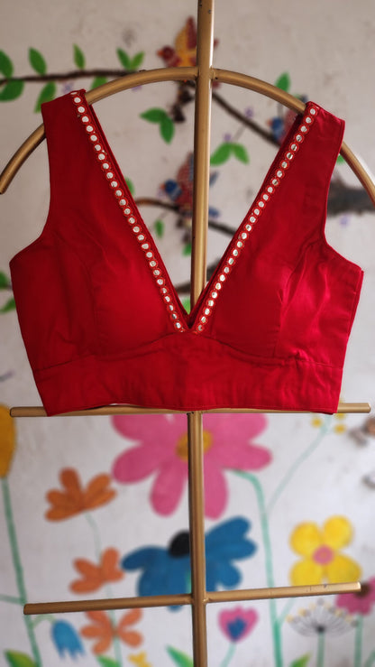 Red Sleeveless Plunge Neck Cottonsilk Blouse