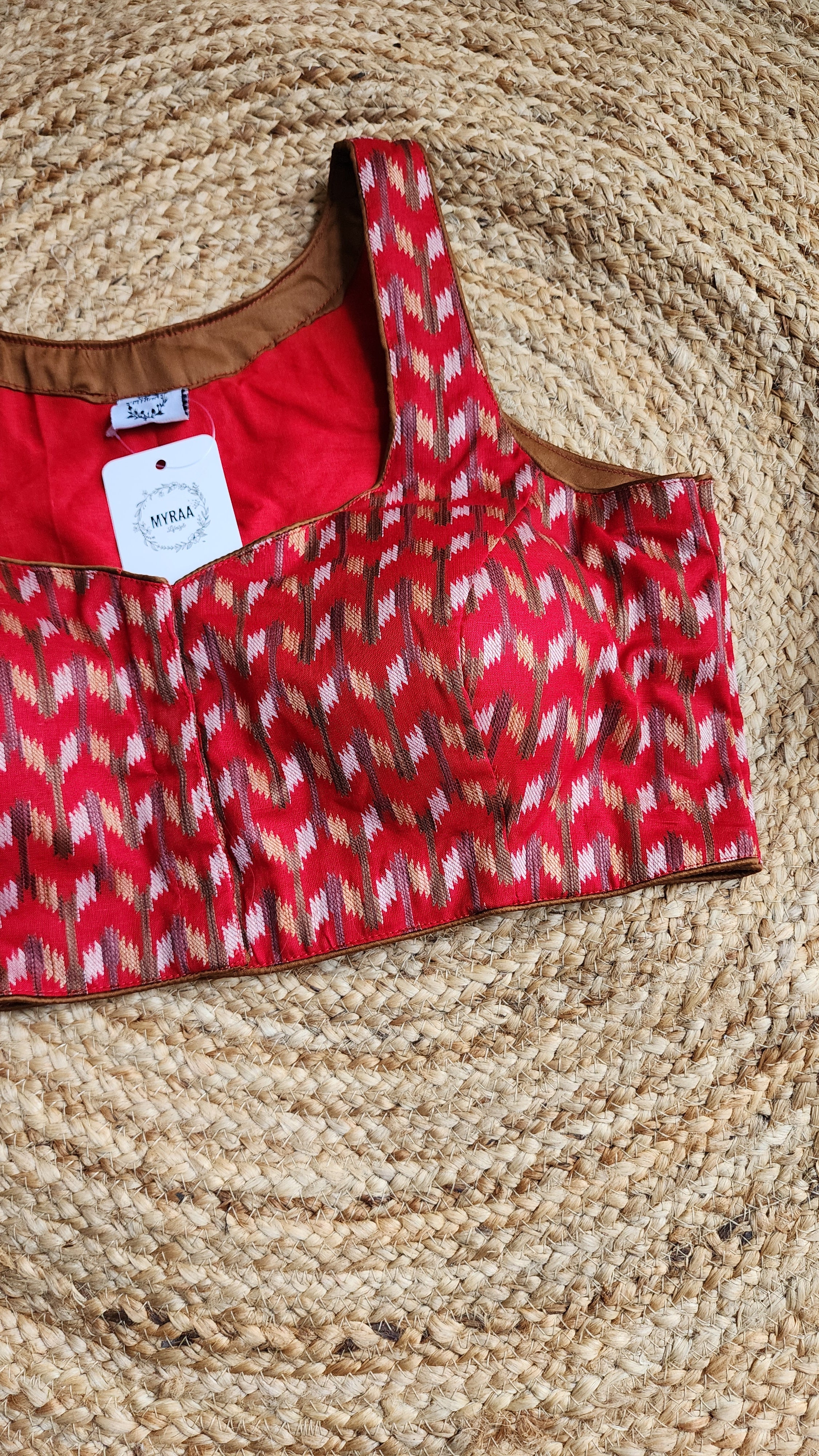 Crimson Air Sleeveless Blouse