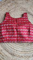 Crimson Air Sleeveless Blouse