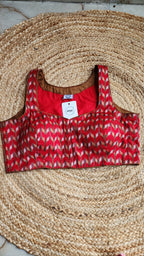 Crimson Air Sleeveless Blouse