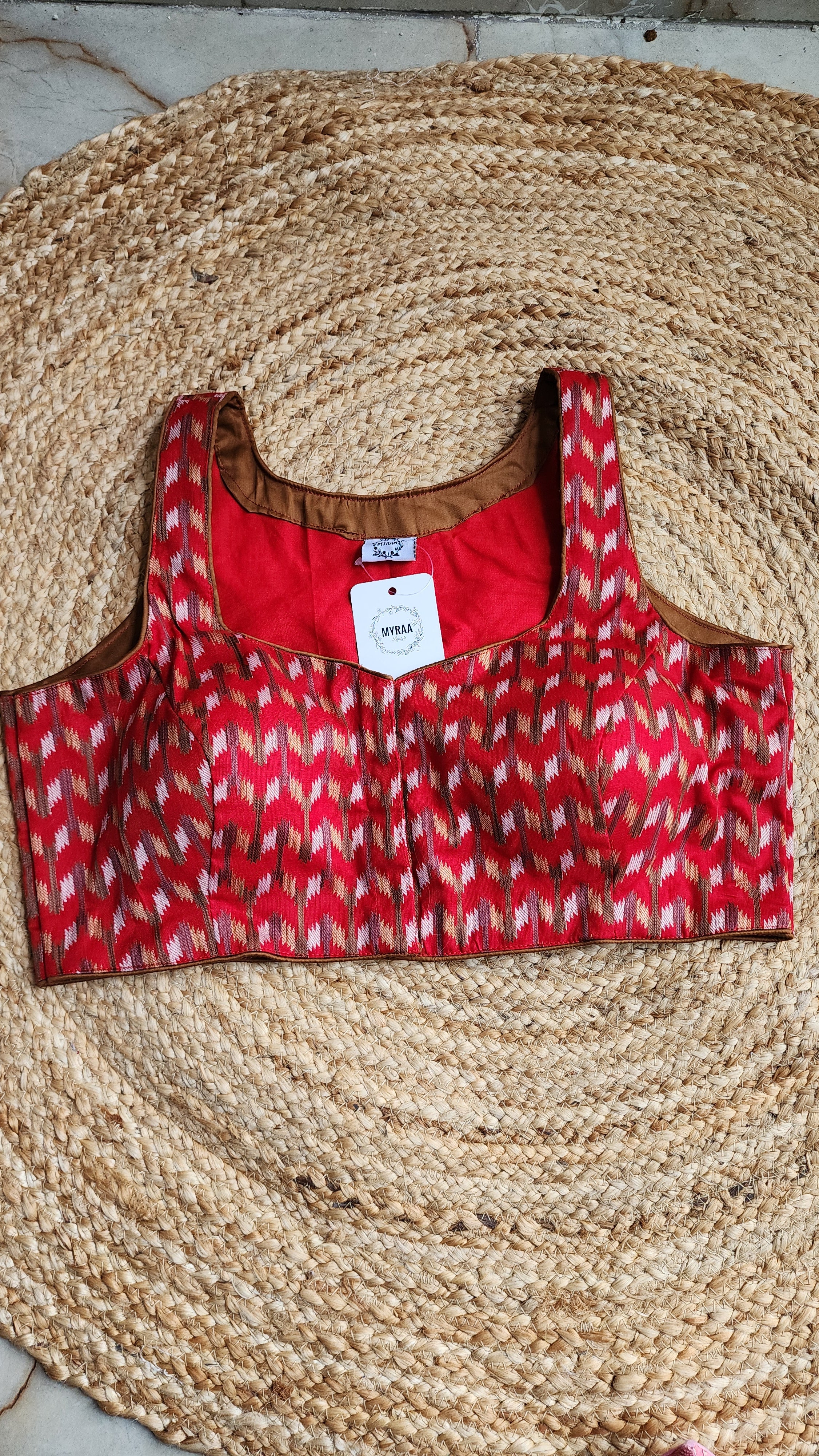 Crimson Air Sleeveless Blouse