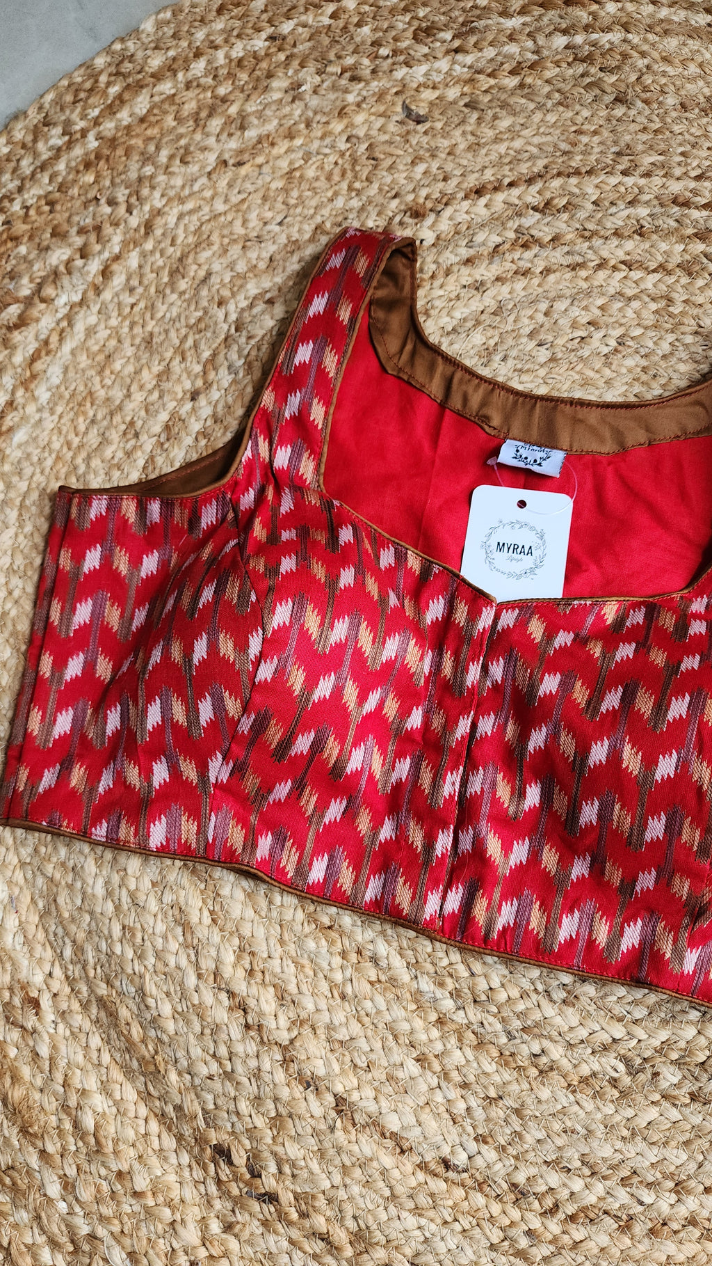 Crimson Air Sleeveless Blouse