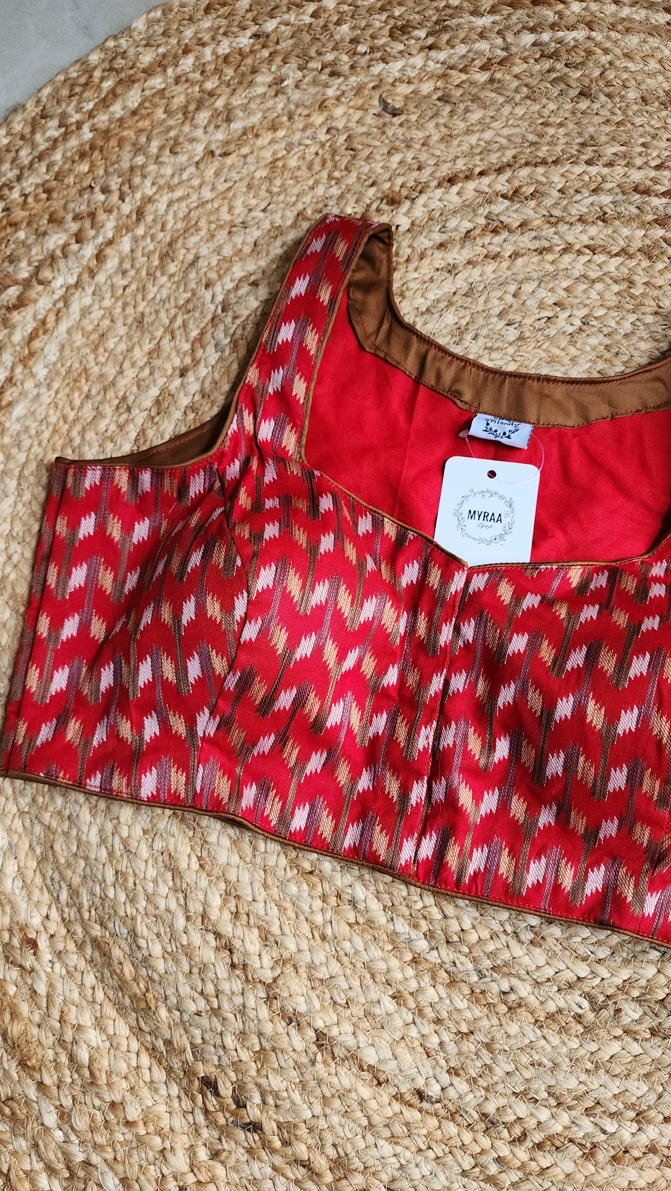 Crimson Air Sleeveless Blouse